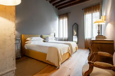 Letto o letti in una camera di Ca' Maddalena - Sole