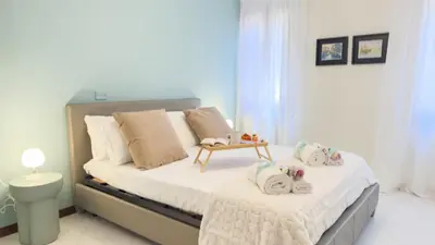 Letto o letti in una camera di Dimora Sotto le Stelle by Ca-Sa Check