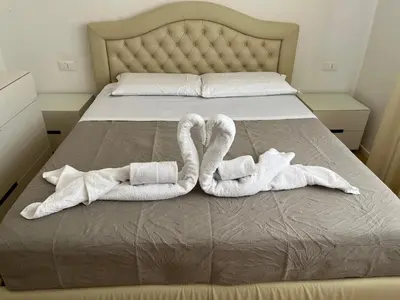 Letto o letti in una camera di Ilary Home