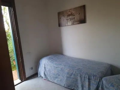 Letto o letti in una camera di Il Glicine di Marco Polo