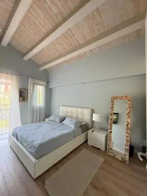 Letto o letti in una camera di Residence Borgo Paradiso