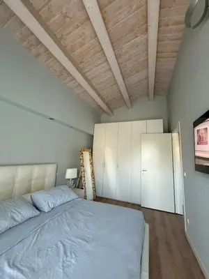 Letto o letti in una camera di Residence Borgo Paradiso