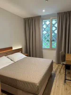 Letto o letti in una camera di Cal Vecia Agriturismo