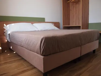 Letto o letti in una camera di Cal Vecia Agriturismo
