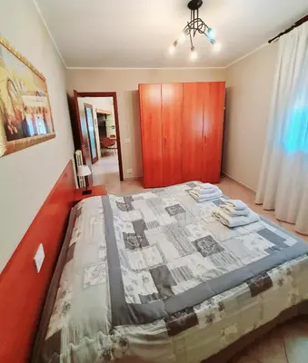 Letto o letti in una camera di Casa Colonna Montegrotto terme