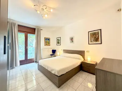 Letto o letti in una camera di Antonella 8 - Carraro Immobiliare - Family Apartments