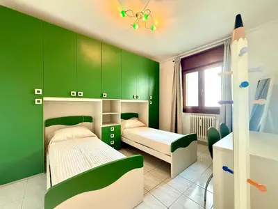 Letto o letti in una camera di Antonella 8 - Carraro Immobiliare - Family Apartments