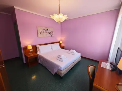 Letto o letti in una camera di Casa Malvina
