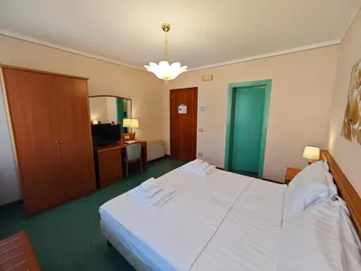 Letto o letti in una camera di Casa Malvina