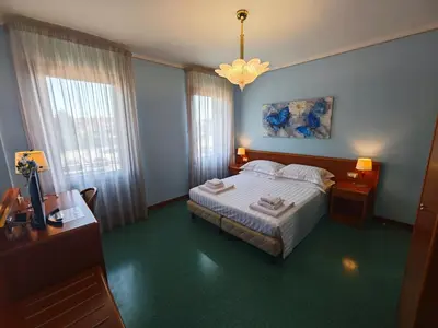 Letto o letti in una camera di Casa Malvina