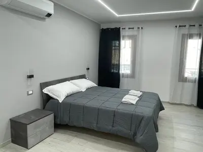 Letto o letti in una camera di Locazione turistica AL PORTO