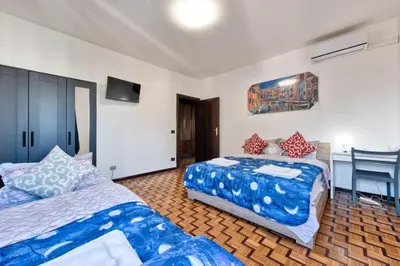 Letto o letti in una camera di Easy Downtown Inn