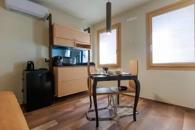 Cucina o angolo cottura di LE RIVE Casa Vacanza La Ciosà