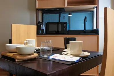 Cucina o angolo cottura di LE RIVE Casa Vacanza La Ciosà