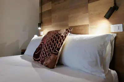 Letto o letti in una camera di LE RIVE Guest House La Ciosà