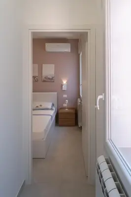 Letto o letti in una camera di Ca' Cesarino