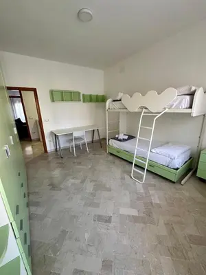 Letto o letti in una camera di Alba Rosa