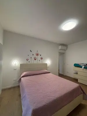 Letto o letti in una camera di Oksy House Free Parking and Tram to Venice at 1 minute