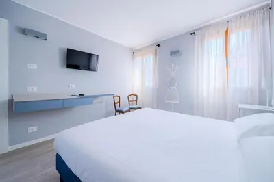Letto o letti in una camera di Suite Mondrian e Suite Monet 100m dalla Biennale