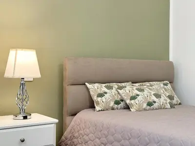 Letto o letti in una camera di Casa delle Rondini