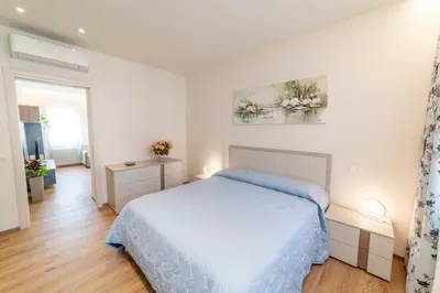Letto o letti in una camera di EnJoy Home - Appartamento Terra, Il Canterale