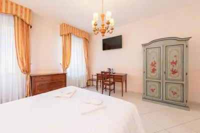 Letto o letti in una camera di La Locandiera