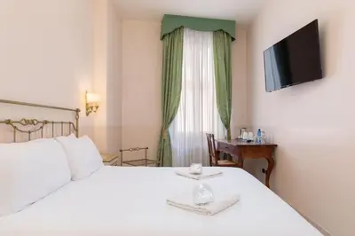 Letto o letti in una camera di La Locandiera