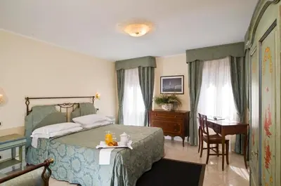 Letto o letti in una camera di La Locandiera