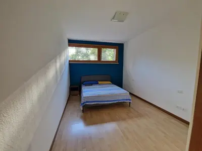 Letto o letti in una camera di Sartorello Residence