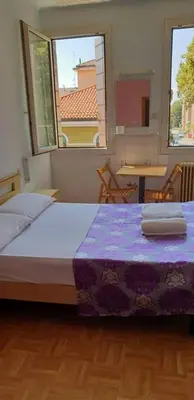 Letto o letti in una camera di Hotel Giovannina