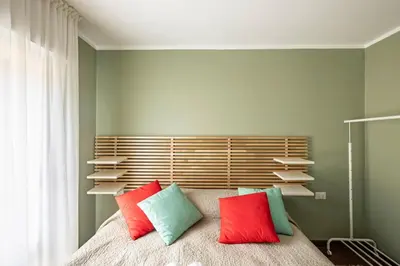 Letto o letti in una camera di GuestHost - Porta Portello Cozy Apartment Padova