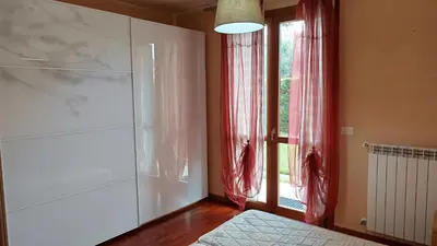Letto o letti in una camera di Appartamento Primavera