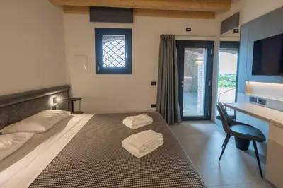 Letto o letti in una camera di Alma Room