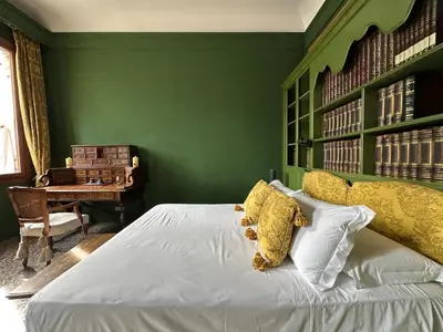 Letto o letti in una camera di Palazzo del '400