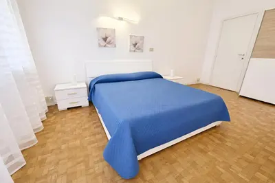 Letto o letti in una camera di Poerio 7th Floor Jacuzzi Bath Apartment