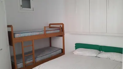 Letto o letti in una camera di Casa Delfino