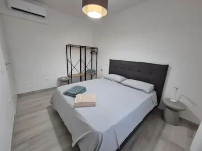 Letto o letti in una camera di Casa Cristina