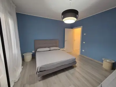 Letto o letti in una camera di Casa Anna