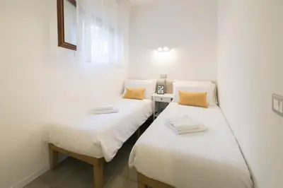 Letto o letti in una camera di Pool, private garden and beach in the city center