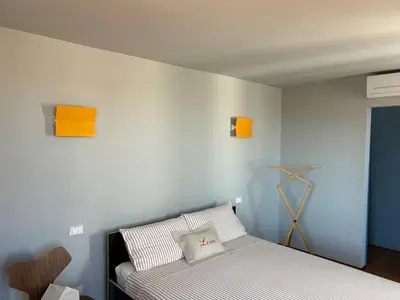 Letto o letti in una camera di Ca' tra le nuvole