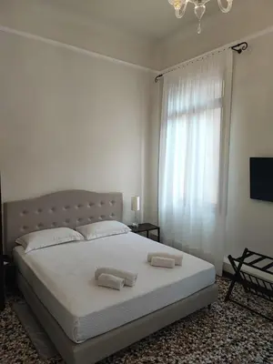 Letto o letti in una camera di Cà degli Stueri