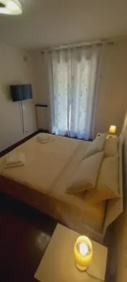 Letto o letti in una camera di Casa Niky