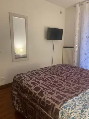Letto o letti in una camera di Casa Niky