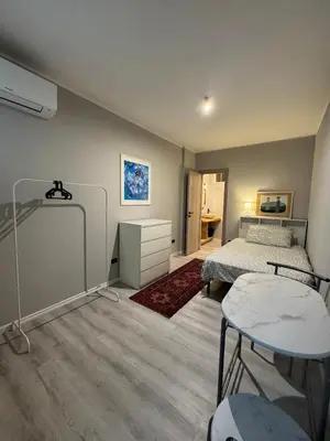 Letto o letti in una camera di Mini cozy apartment in Prato della Valle