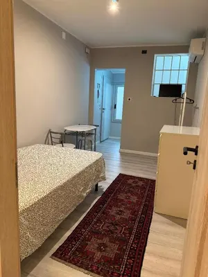 Letto o letti in una camera di Mini cozy apartment in Prato della Valle