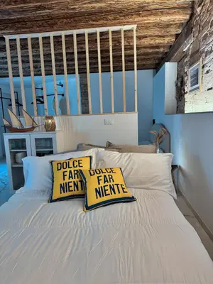 Letto o letti in una camera di Appartamento Dolce Far Niente