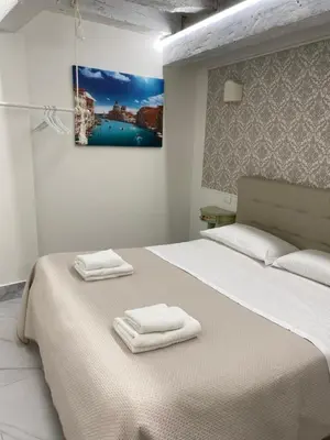 Letto o letti in una camera di Dimora Boscolo, Zona Castello