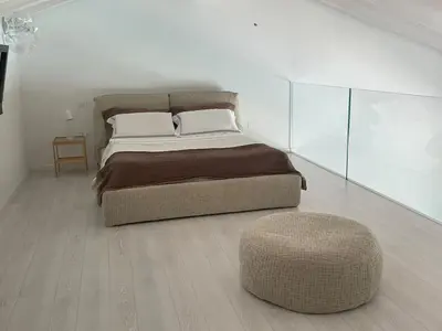 Letto o letti in una camera di Luxury Loft Ai 2 lecci Relaxing oasis with pool