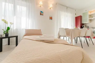 Letto o letti in una camera di Trilocale riammodernato vicino a Venezia & Riviera