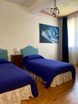 Letto o letti in una camera di Camera Canova